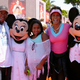 Bobby Brown and Whitney Houston with their daughter, Bobbi Kristina (Lisa Rose/Disney Parks via Getty Images)